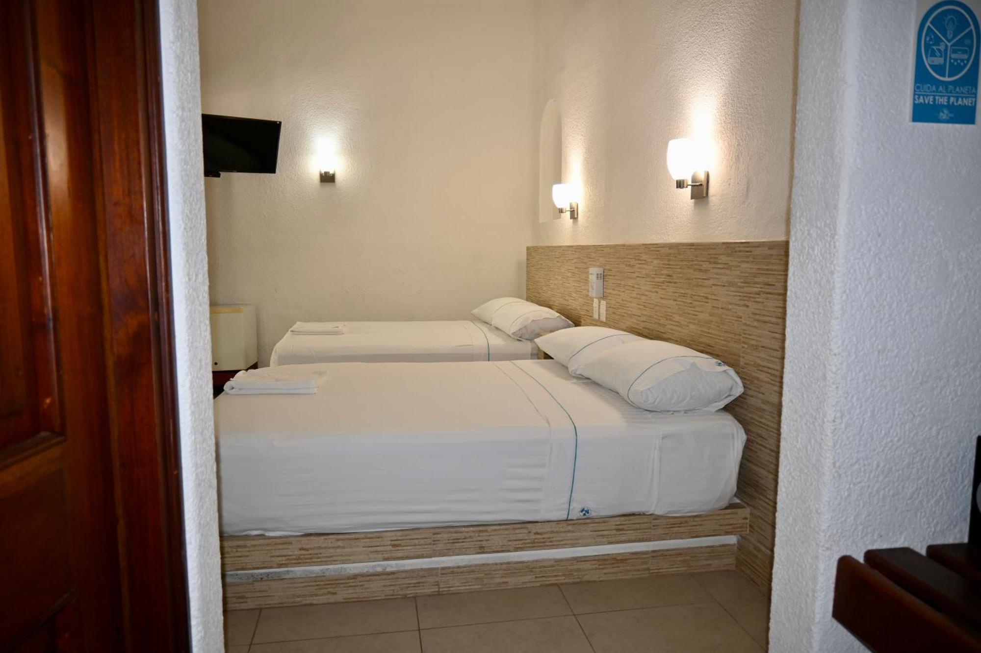 Pelicano Inn Playa Del Carmen - Beachfront Hotel Buitenkant foto